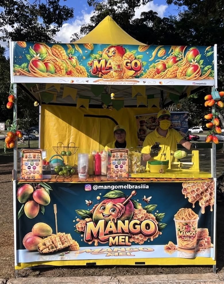 Barraca amarela do Mango Mel no parque